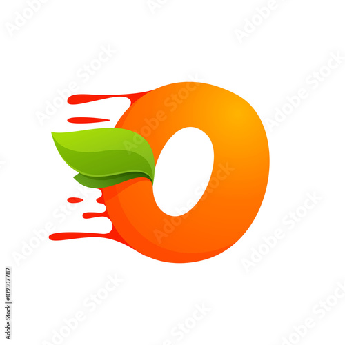 O letter with orange juice drops and leaves.