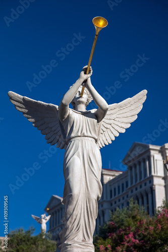 Photography Angel playing golden bugle