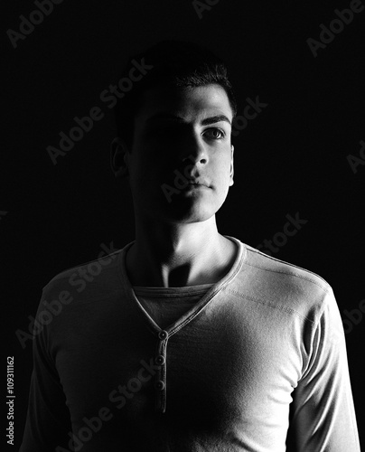 stylish young man portrait in low-key
