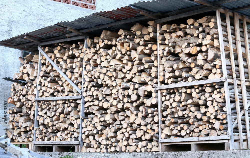 large shed with many pieces of wood to make fire