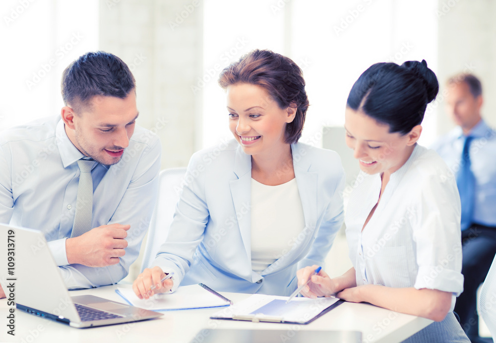 business team discussing something in office business team discussing something in office