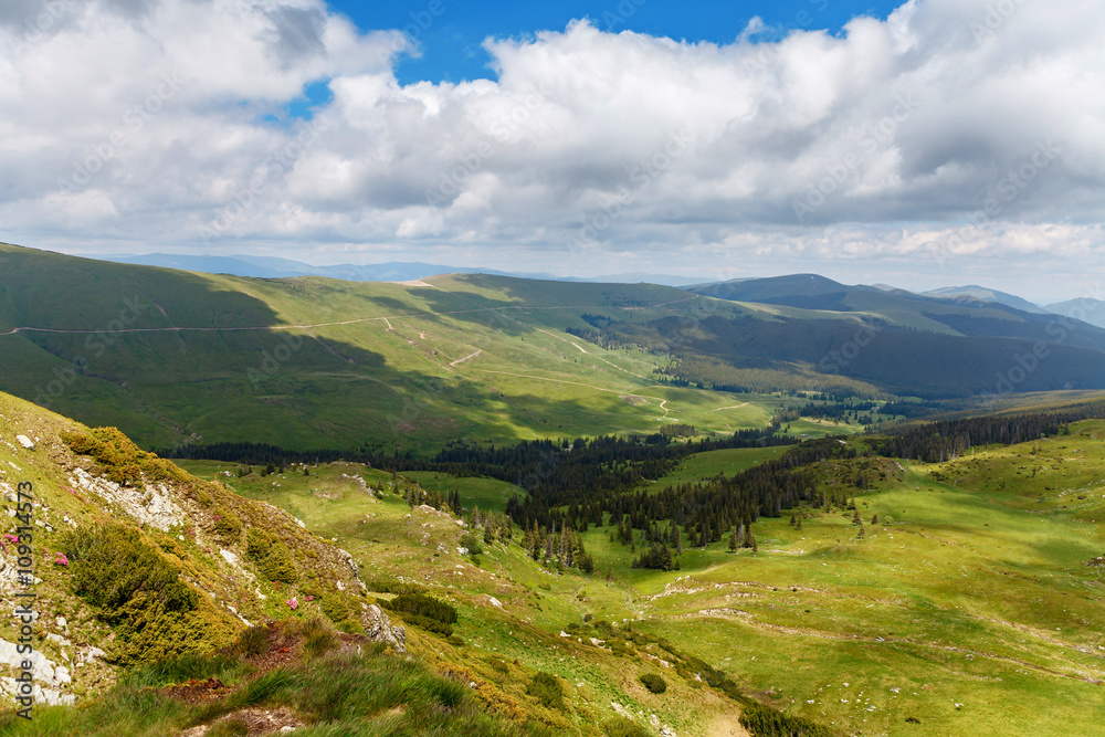 Cloudy sky over motorcycle roads in Carpathians, Romania