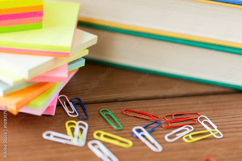 close up of pens, books, clips and stickers close up of pens, books, clips and stickers