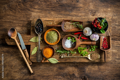 Fototapeta Naklejka Na Ścianę i Meble -  Colorful spices on wooden table