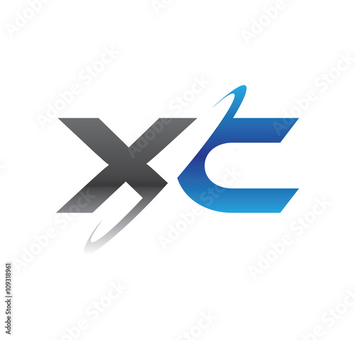 xc initial logo with double swoosh blue and grey