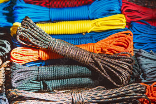colored parachute cord coiled rope tangling photo