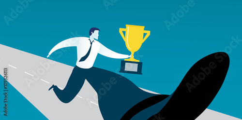 Successful businessman with trophy