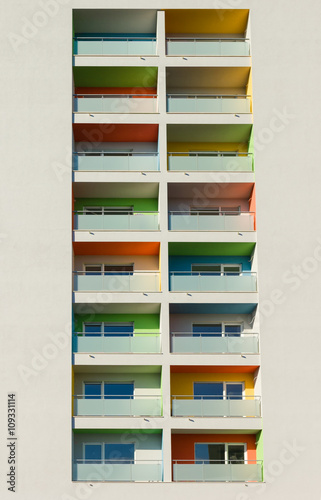High modern building with many colorful balconies © Marina P.