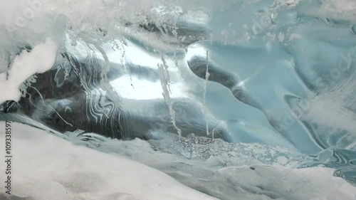  Blue ice. Water melts and flows on ice