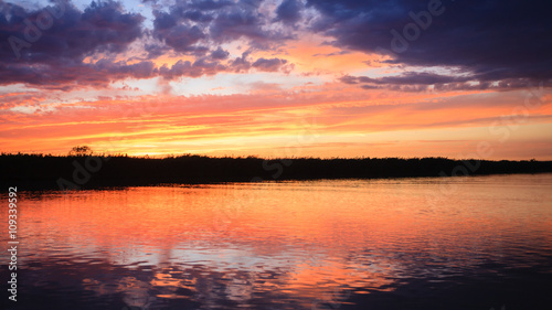 Sunset over water © elleonzebon