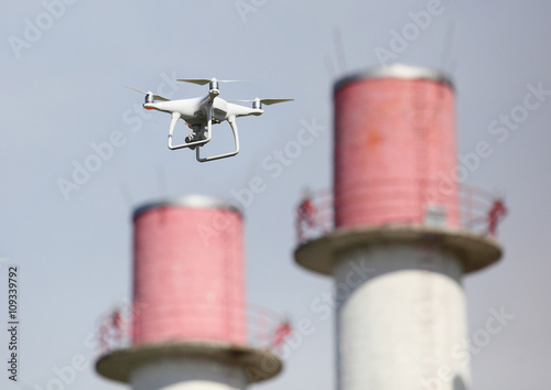 Drone over power plant with chimneys. Heavy industry from above. Power and fuel generation.