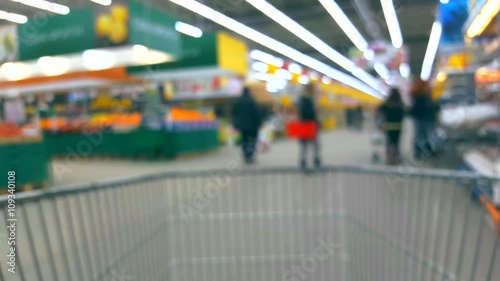 Wallpaper Mural Defocused blurred background supermarket interior with buyers with trolley Torontodigital.ca