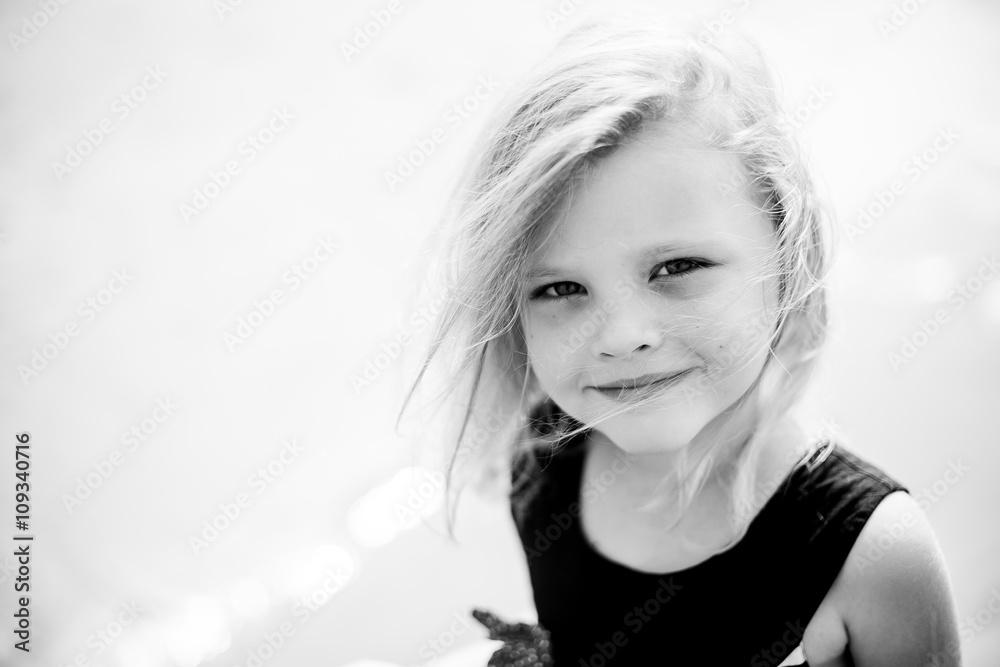 Outdoor portrait of cute little girl in summer day Outdoor portrait of cute little girl in summer day