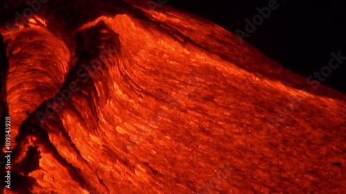 Hawaiian lava flow entering the ocean