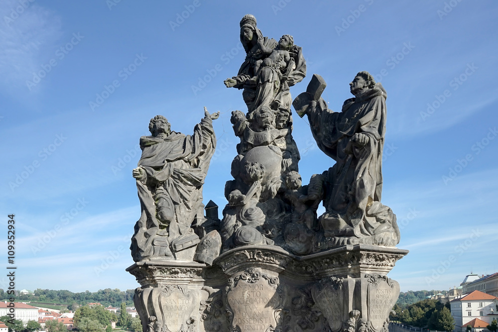 Statue of Saints Dominic and Thomas on Charles Bridge in Prague