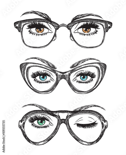 Hand drawn women's eyes with vintage glasses photo