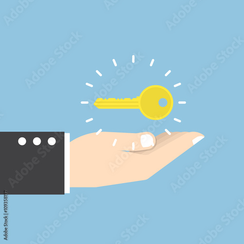 Businessman with golden key over his hand