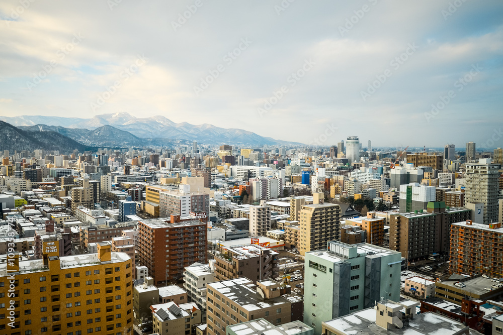 SAPPORO, JAPAN - December 22, 2015: Street view of Buildings aro