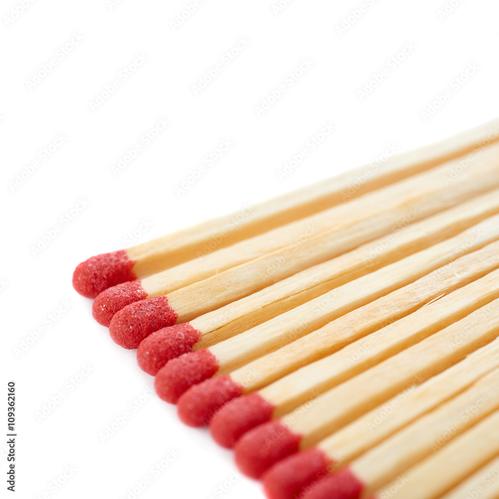 Pile of Wooden matches isolated over the white background Pile of Wooden matches isolated over the white background