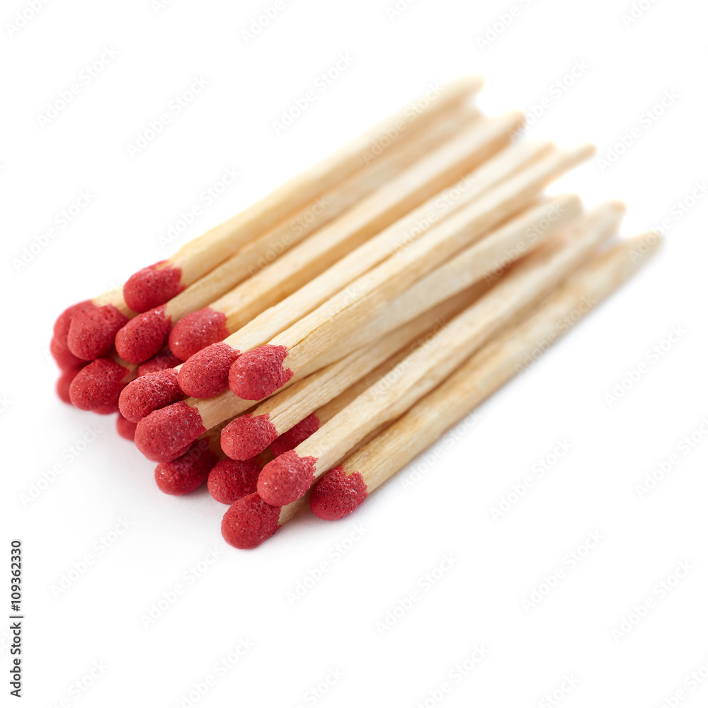 Pile of Wooden matches isolated over the white background