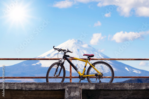 Beautiful mountain bike on concrete bridge with Fuji mountain background.