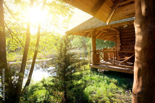 Wooden house and pond