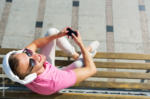 Guy in headphones enjoying music