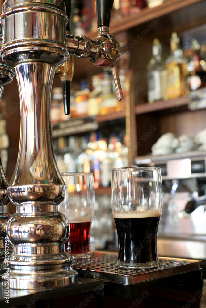 Chrome beer taps with highlights in the pub Chrome beer taps with highlights in the pub