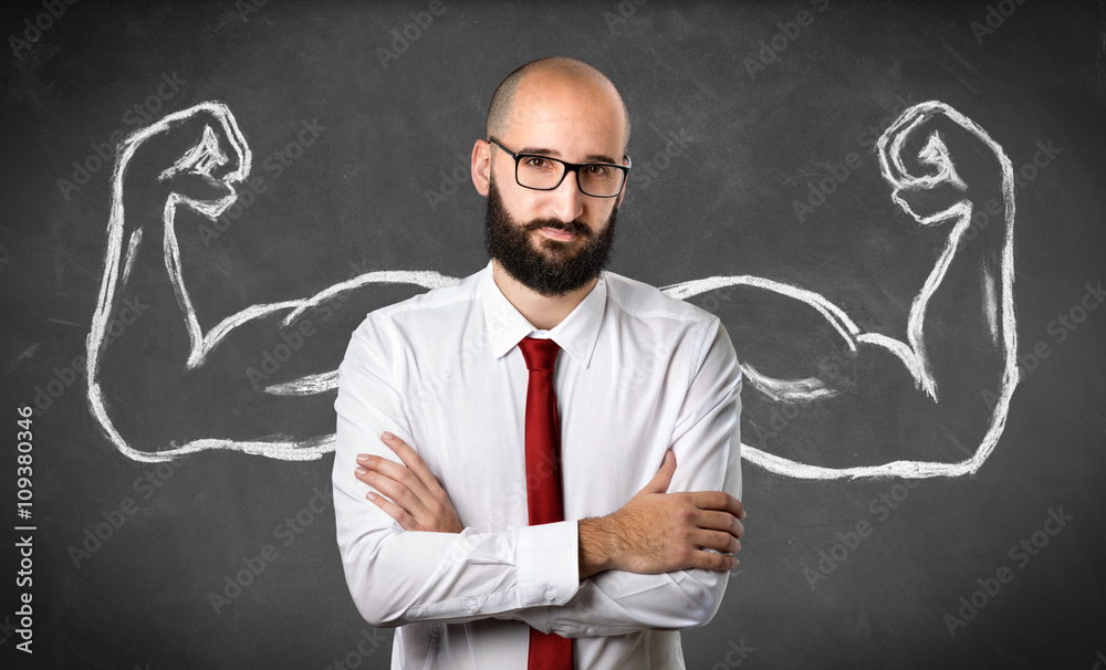 Strong Businessman - Muscles Drawn On Blackboard
