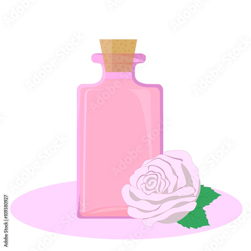 Glass bottle full of rose essential oil