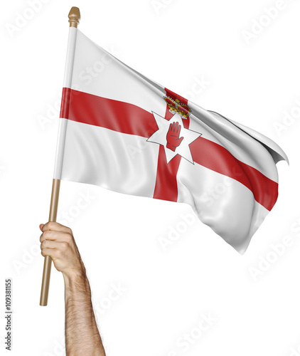 Hand proudly waving the national flag of Northern Ireland, 3D rendering