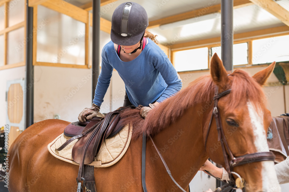 Horse riding - lovely equestrian on a horse Horse riding - lovely equestrian on a horse