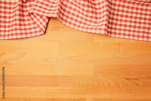 Background with tablecloth on wooden rustic counter. View from above