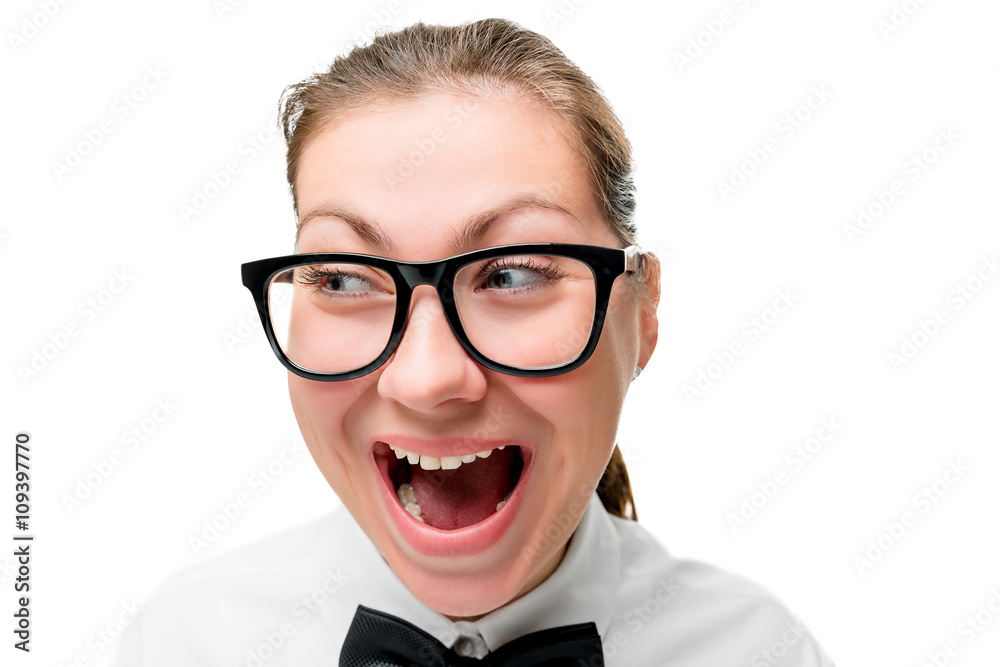 woman in fashion glasses screaming on a white background, face c