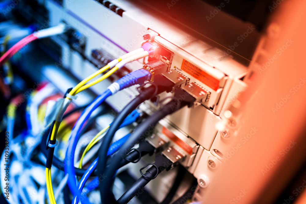 fiber optic with servers in a technology data center fiber optic with servers in a technology data center