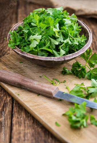Parsley (on wooden background)