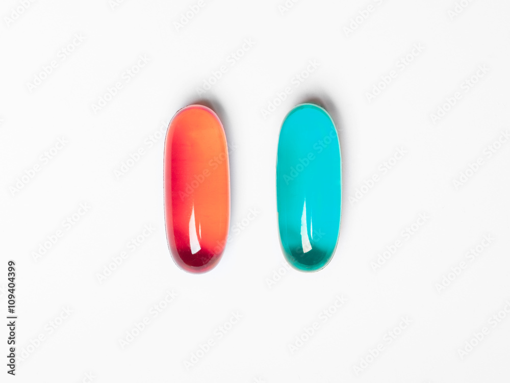 red and blue pills isolated on white background red and blue pills isolated on white background