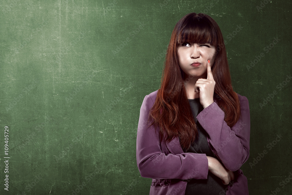 Asian business woman thinking something Asian business woman thinking something