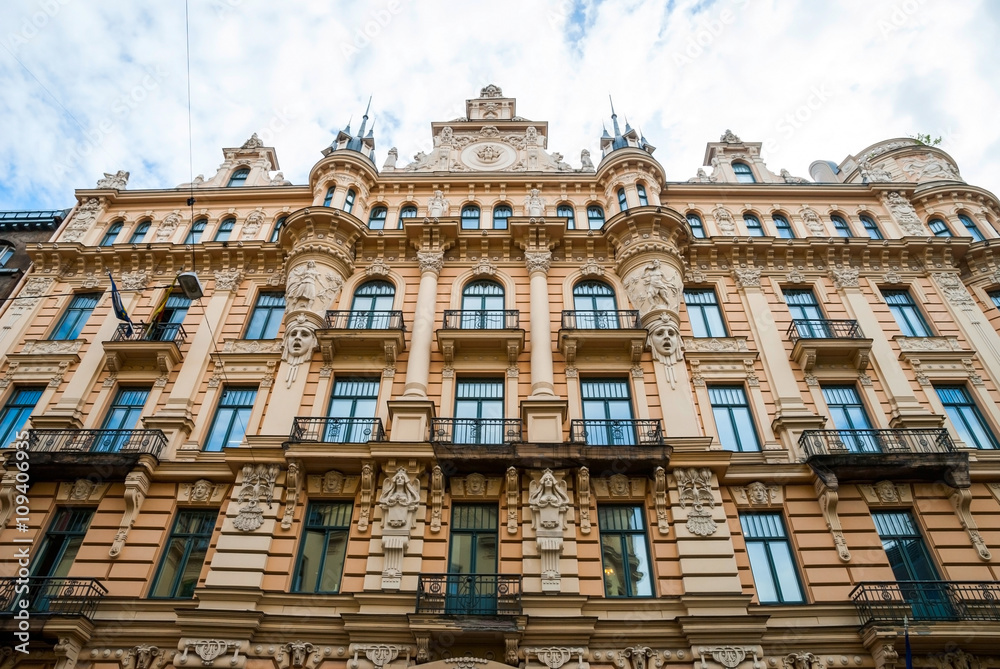 View on decorated building facade with balconies