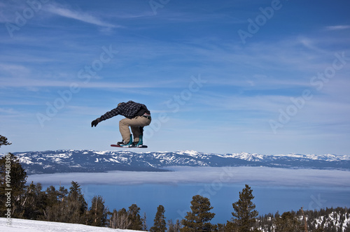 Snowboarder Jumping Lake Tahoe