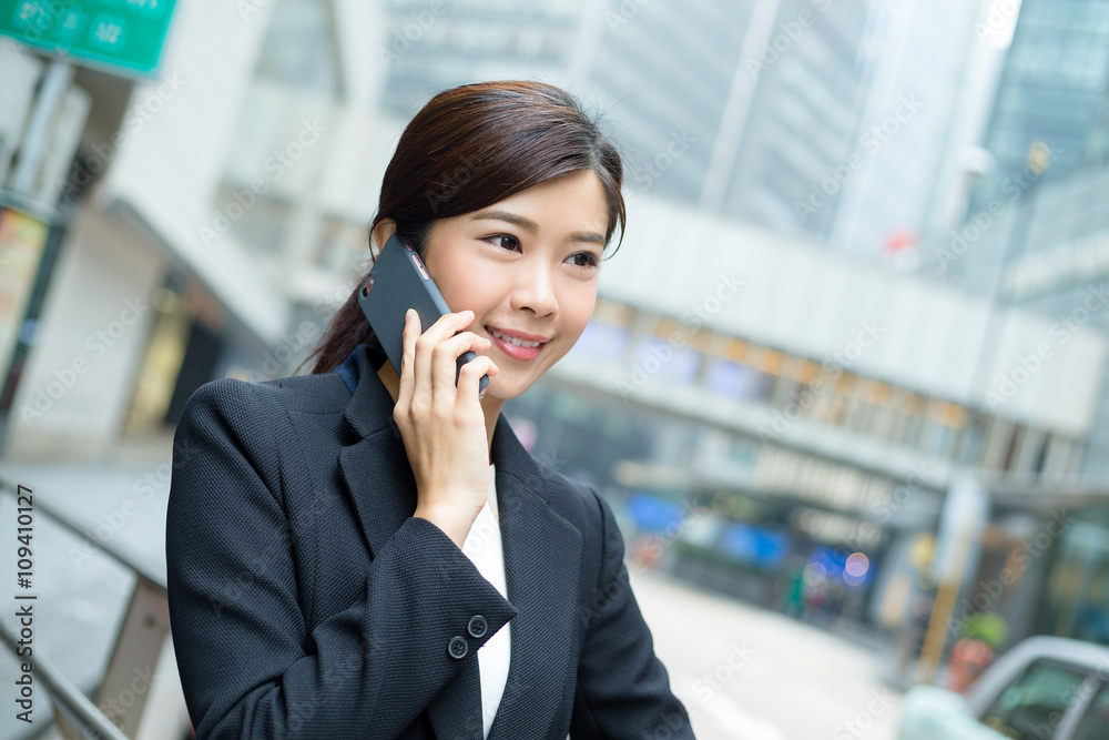 Businesswoman talking on her phone Businesswoman talking on her phone