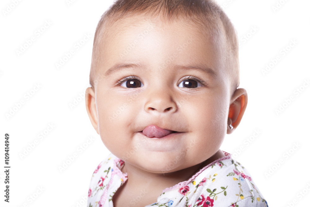 Portrait of lovely baby girl sticking tongue out Portrait of lovely baby girl sticking tongue out