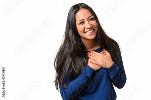 Young woman showing her heartfelt gratitude