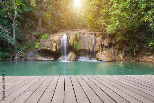 Fototapeta Naklejka Na Ścianę i Meble -  Wooden plank and background with Waterfall