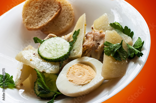 healthy salad with potatoes, chicken end egg