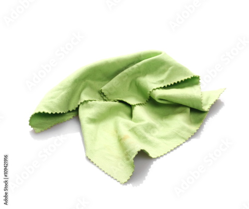 Crumpled green microfiber cloth isolated on white background
