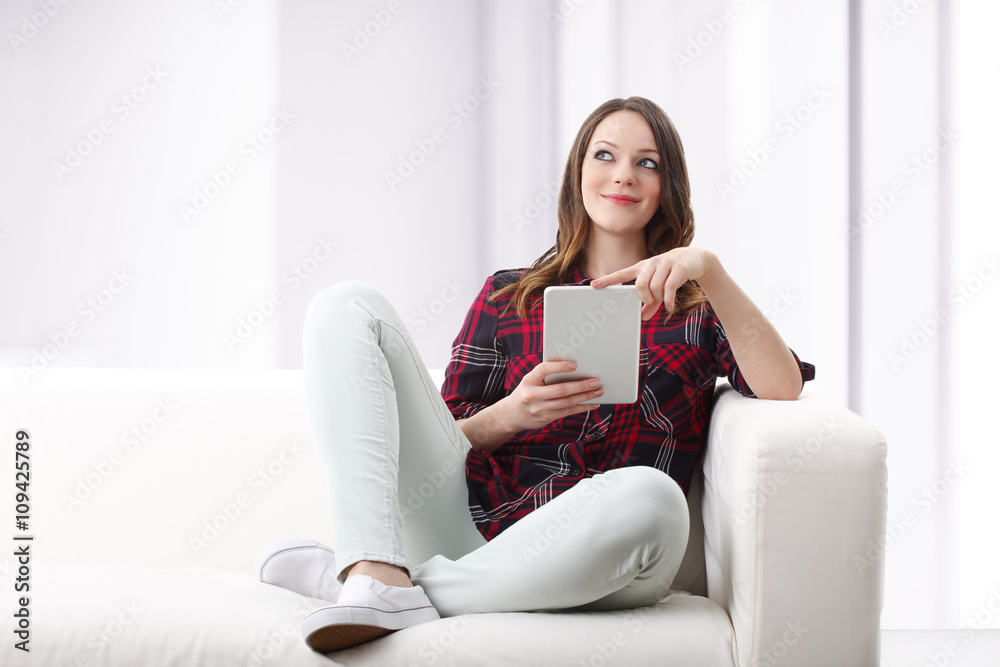Smiling woman with laptop