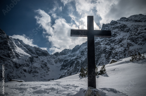 Iron cross over Morskie Oko in Tatra mountains