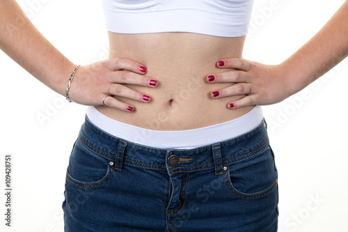 Woman in cotton underwear and jeans showing slimming concept © OceanProd