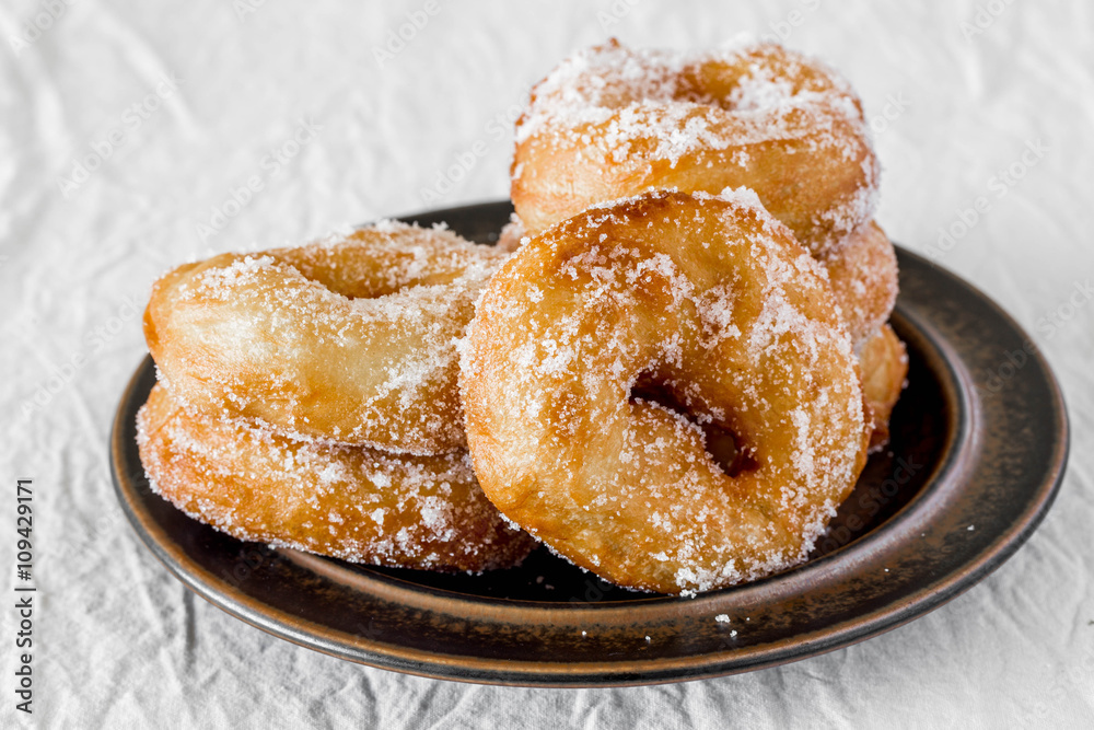 Finnish traditional Vappuu food, sugar donuts with sima